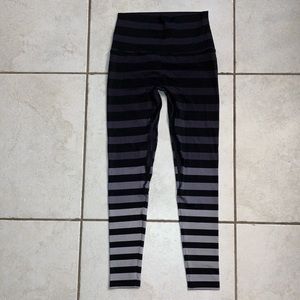 Medium K Deer Striped Leggings. Black and grey